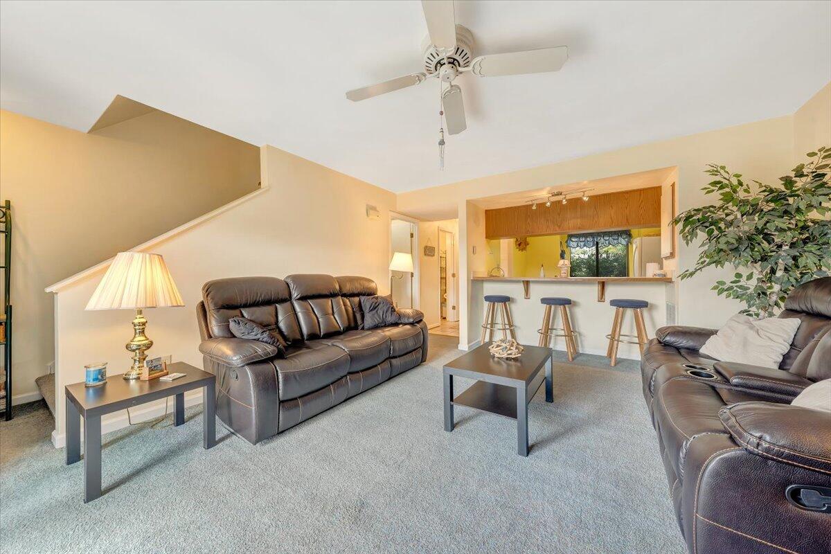 301 Harbor Ridge Drive Goodview, VA 24095 - Photo 11 of 56 a living room with furniture and a large window