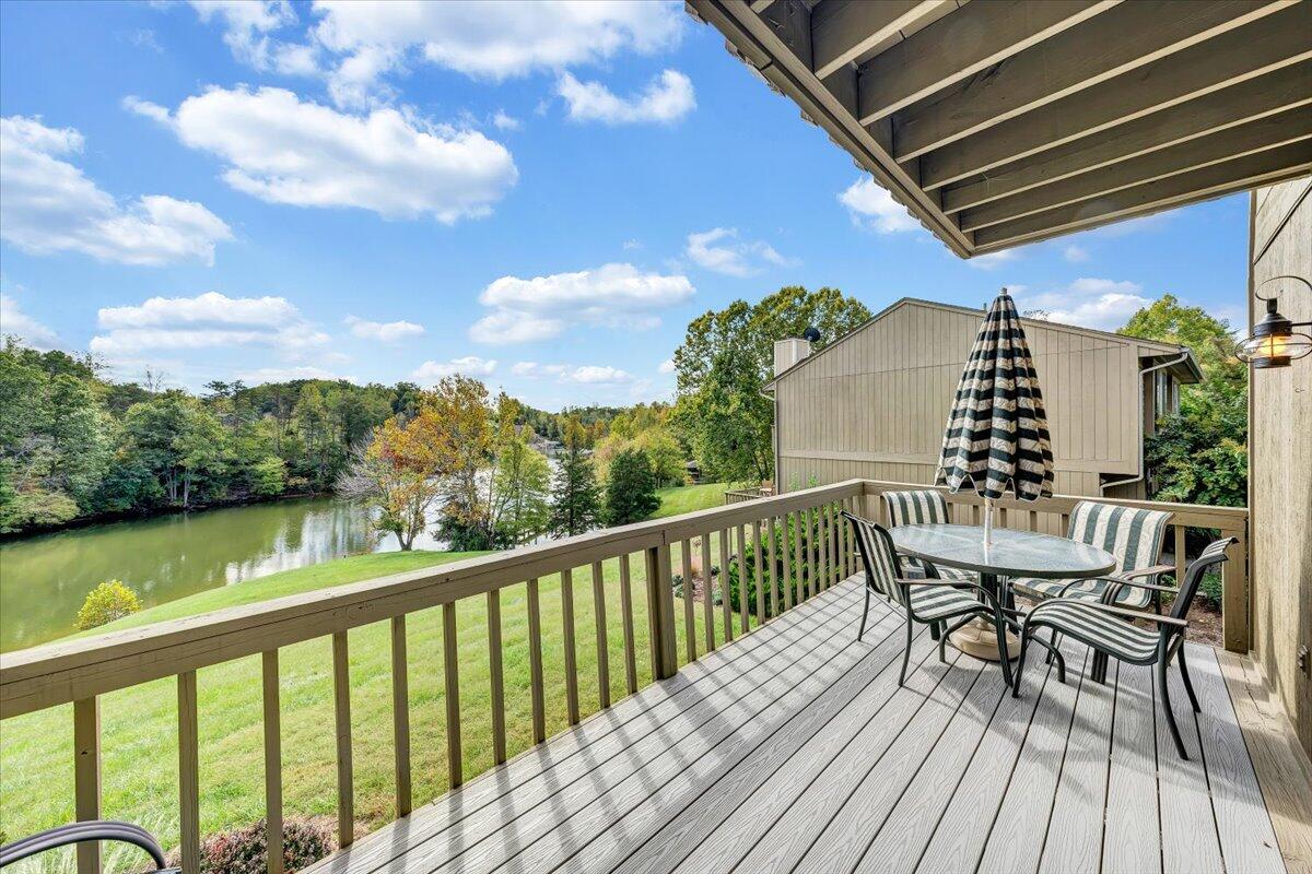 301 Harbor Ridge Drive Goodview, VA 24095 - Photo 22 of 56 a view of a balcony with furniture