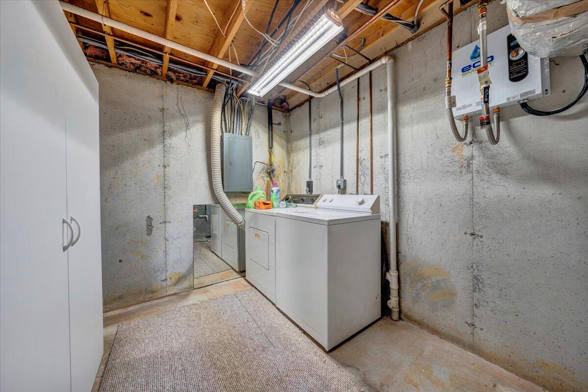 301 Harbor Ridge Drive Goodview, VA 24095 - Photo 29 of 56 a utility room with dryer and washer