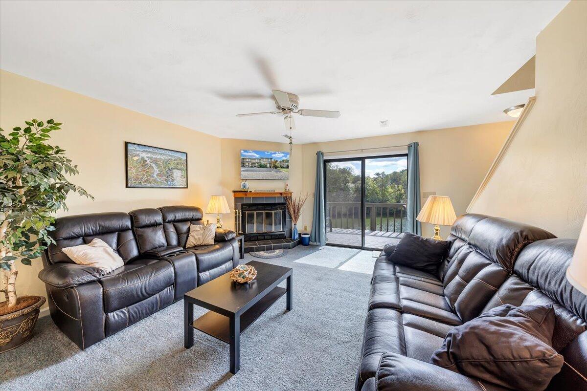 301 Harbor Ridge Drive Goodview, VA 24095 - Photo 4 of 56 a living room with furniture and a large window
