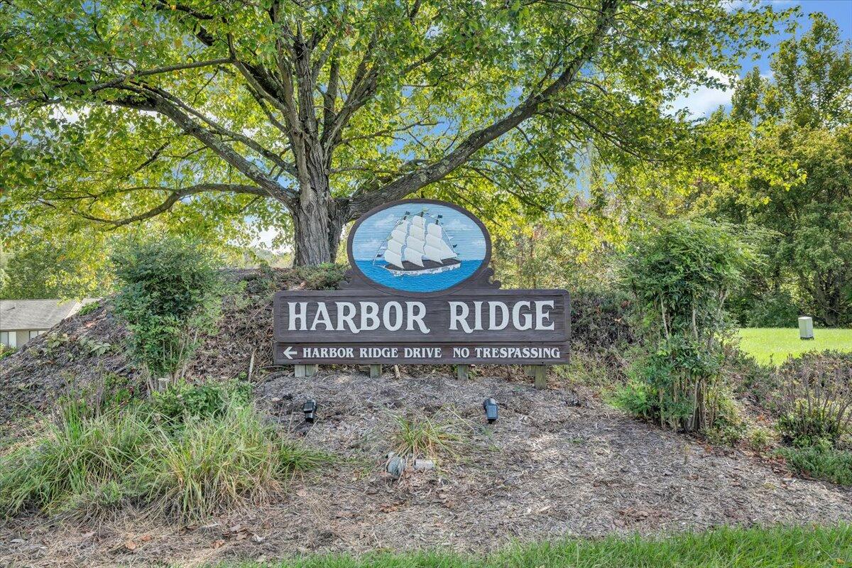 301 Harbor Ridge Drive Goodview, VA 24095 - Photo 36 of 56 a view of sign board with large trees