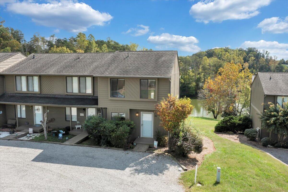 301 Harbor Ridge Drive Goodview, VA 24095 - Photo 37 of 56 a view of a house with a garden