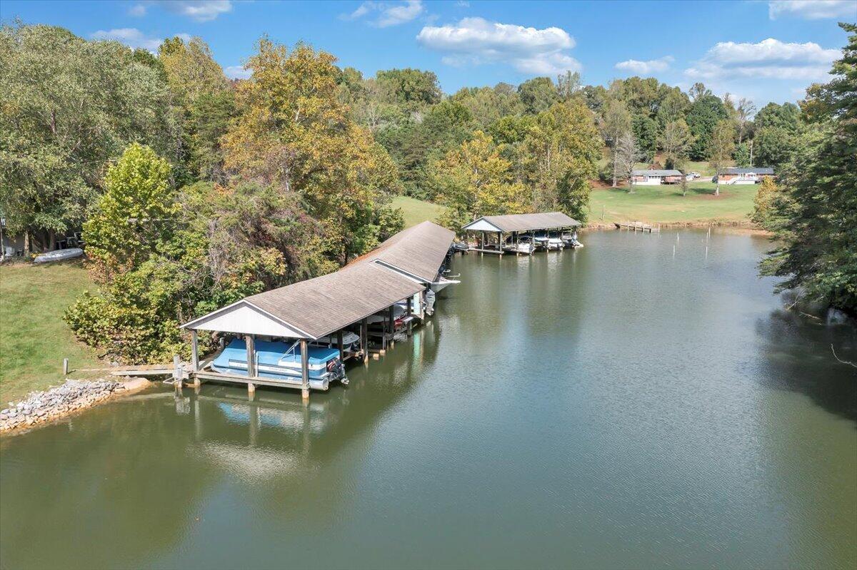 301 Harbor Ridge Drive Goodview, VA 24095 - Photo 47 of 56 a view of a lake with houses