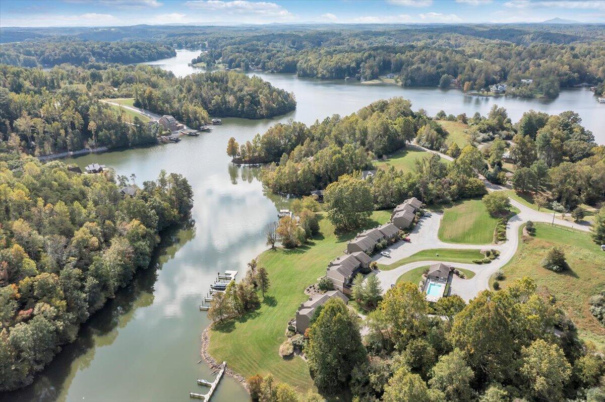 301 Harbor Ridge Drive Goodview, VA 24095 - Photo 50 of 56 a view of a lake with a mountain in the back