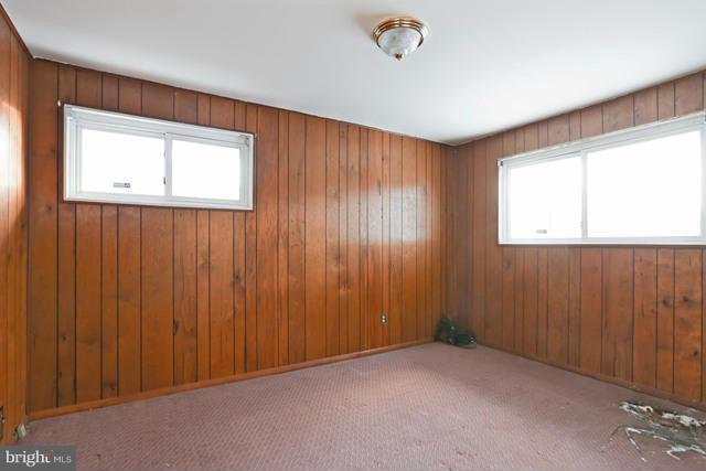 8704 Riggs Road Hyattsville, MD 20783 - Photo 14 of 25 an empty room with windows