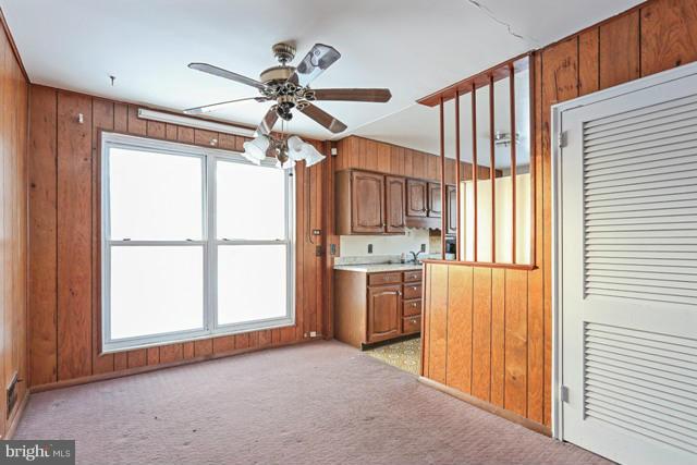 8704 Riggs Road Hyattsville, MD 20783 - Photo 21 of 25 a view of an empty room with a window