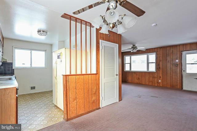 8704 Riggs Road Hyattsville, MD 20783 - Photo 22 of 25 a view of an empty room with a window
