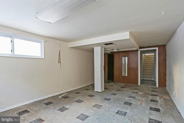 8704 Riggs Road Hyattsville, MD 20783 - Photo 5 of 25 a view of a big room with closet and windows