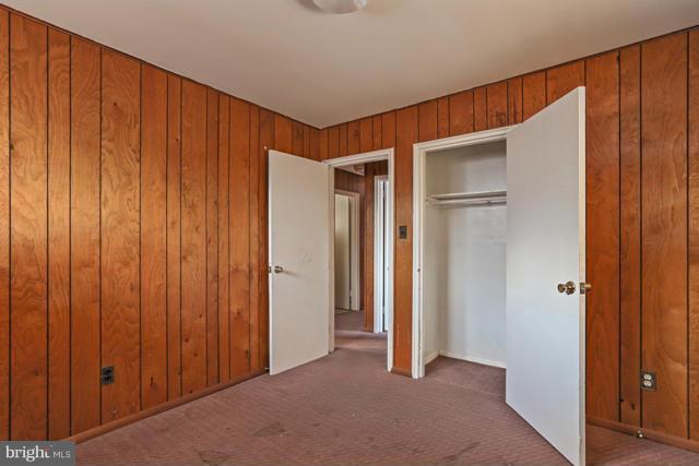 8704 Riggs Road Hyattsville, MD 20783 - Photo 9 of 25 a view of hallway with shower