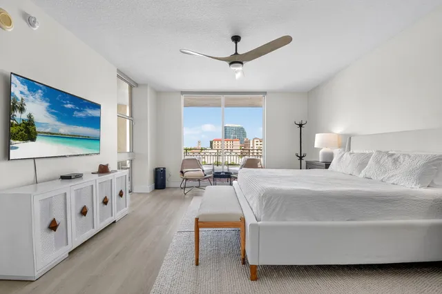a bathroom with a double vanity sink toilet and a mirror