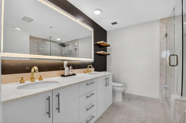 a view of a city with tall buildings