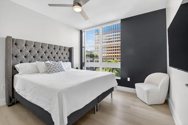 a view of a balcony with furniture