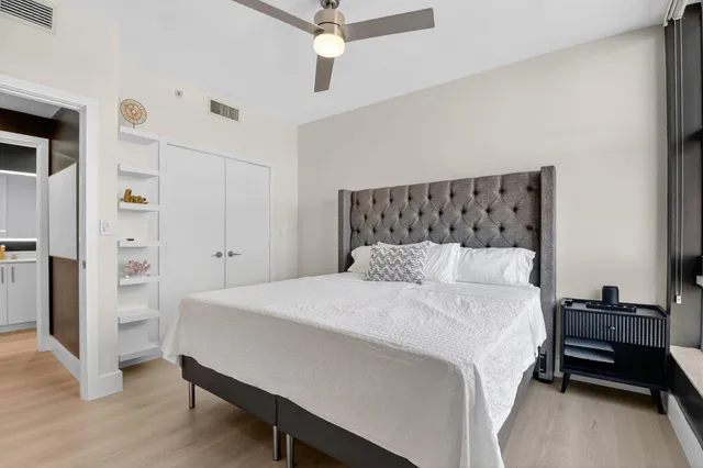 a room with furniture and potted plant