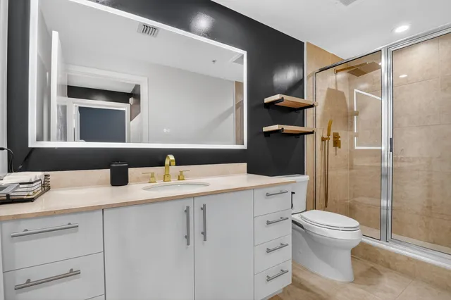 a view of a swimming pool with outdoor seating