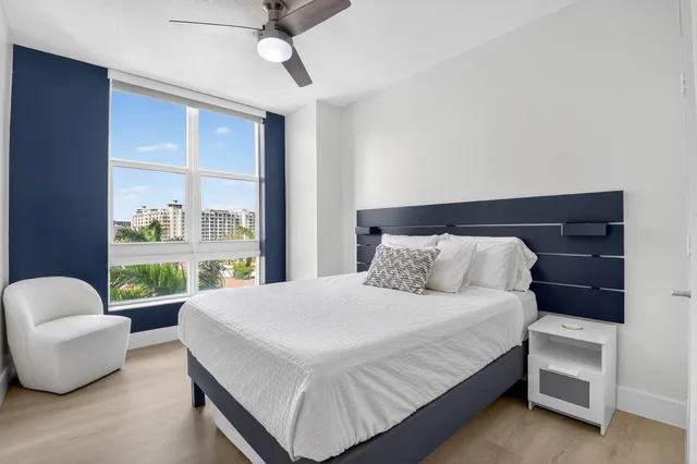 a view of a swimming pool with a yard