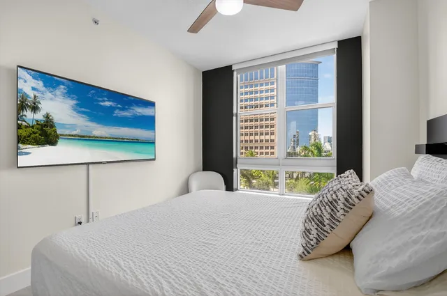 a dining room with a table and chairs