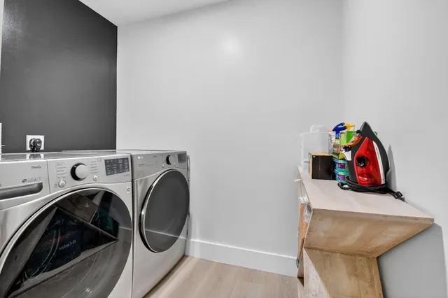 a living room with a bed and a couch