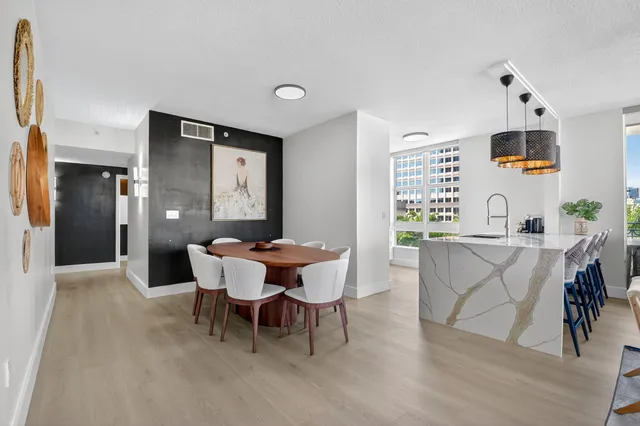 a kitchen with a sink and a window