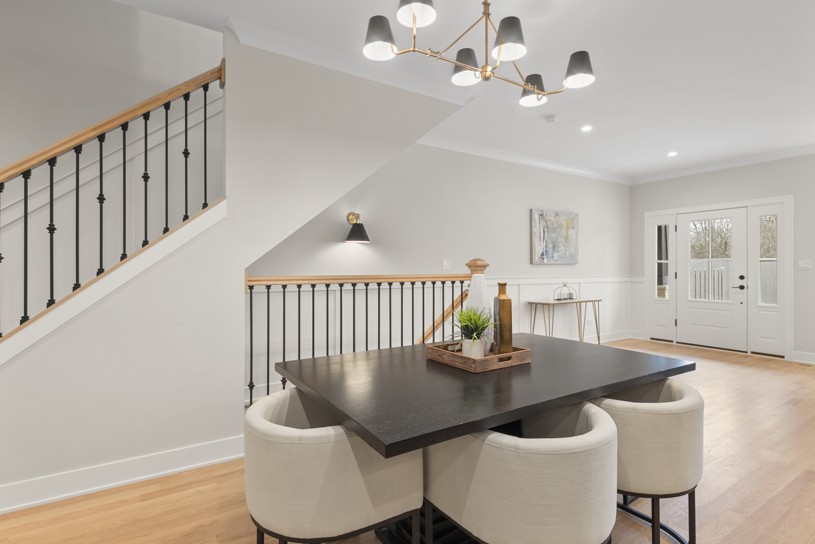11329 1st Street Mokena, IL 60448 - Photo 12 of 36 a view of a dining room with furniture and wooden floor