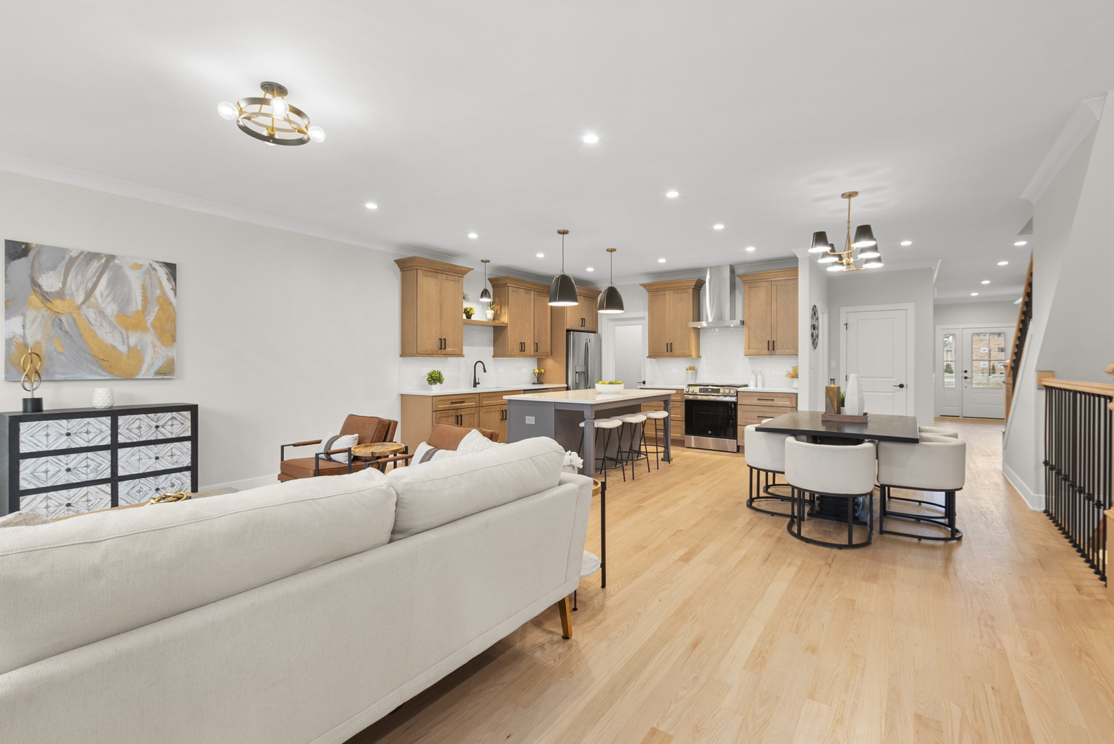 11329 1st Street Mokena, IL 60448 - Photo 19 of 36 a living room with furniture kitchen view and a table