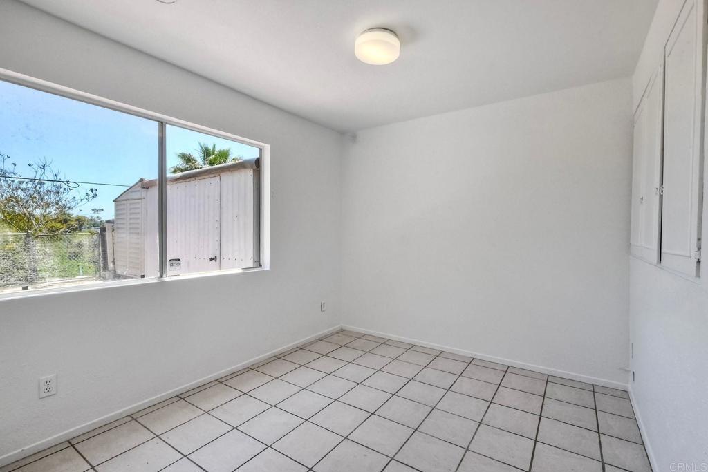 4549 Quailridge Drive Oceanside, CA 92056 - Photo 14 of 25 a view of an empty room and window