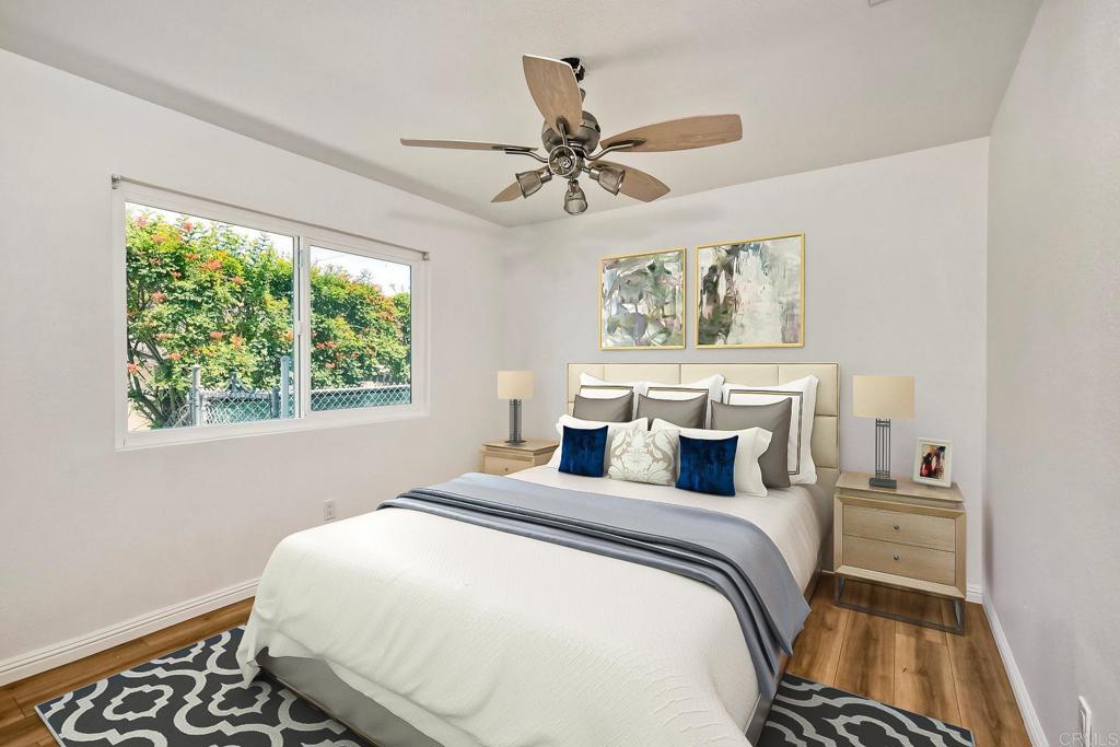 4549 Quailridge Drive Oceanside, CA 92056 - Photo 17 of 25 a bedroom with a bed and a window