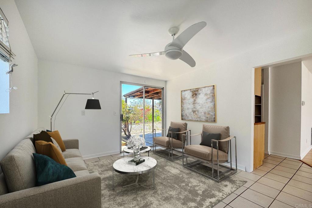 4549 Quailridge Drive Oceanside, CA 92056 - Photo 19 of 25 a living room with furniture and a window