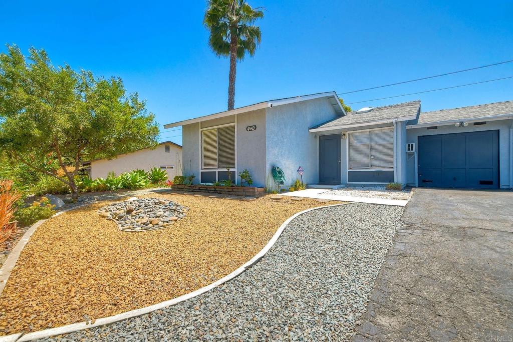 4549 Quailridge Drive Oceanside, CA 92056 - Photo 7 of 25 a view of backyard of a house