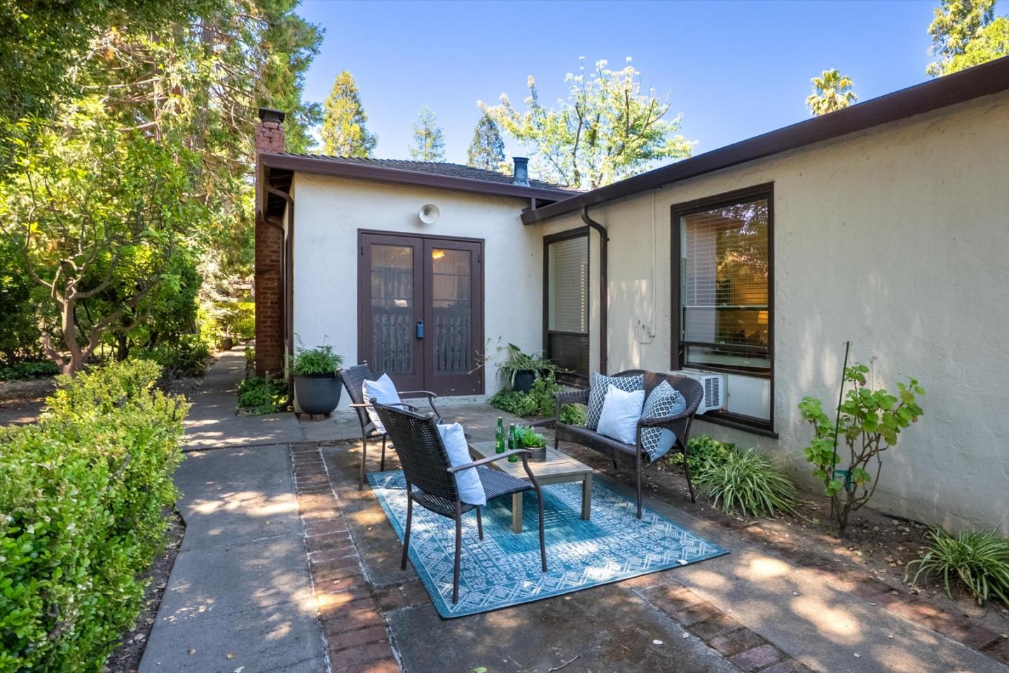 16899 Kennedy Road Los Gatos, CA 95032 - Photo 29 of 61 a view of a patio with a table and chairs in patio