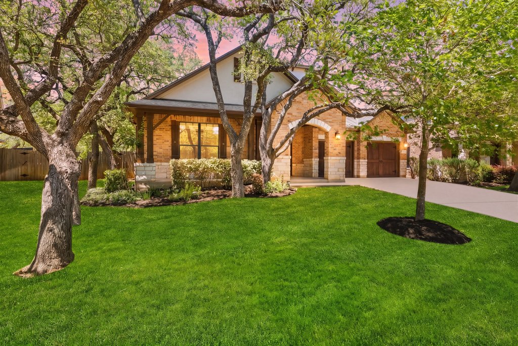 Tucked behind a private gate in The Enclave at Circle C, this beautifully maintained single-story residence offers 2,758 square feet of elegant living on a generous .24-acre greenbelt lot. The HOA includes front lawn care.