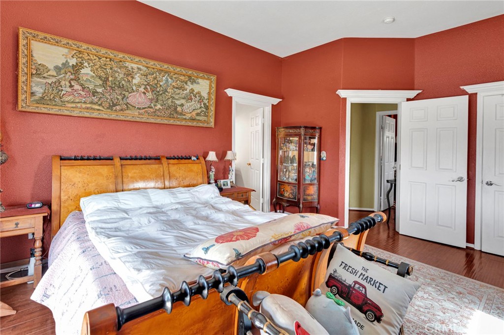 20151 Serrano Road Apple Valley, CA 92307 - Photo 26 of 59 a bedroom with a bed and a dresser