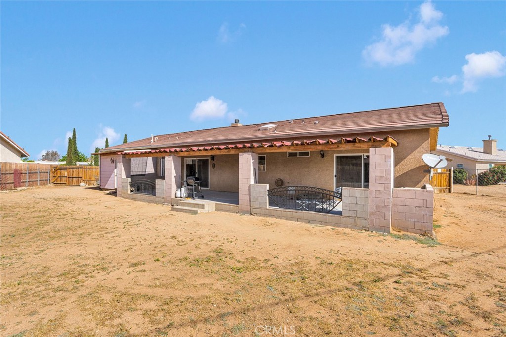 20151 Serrano Road Apple Valley, CA 92307 - Photo 43 of 59 a view of a house with a snow in the yard