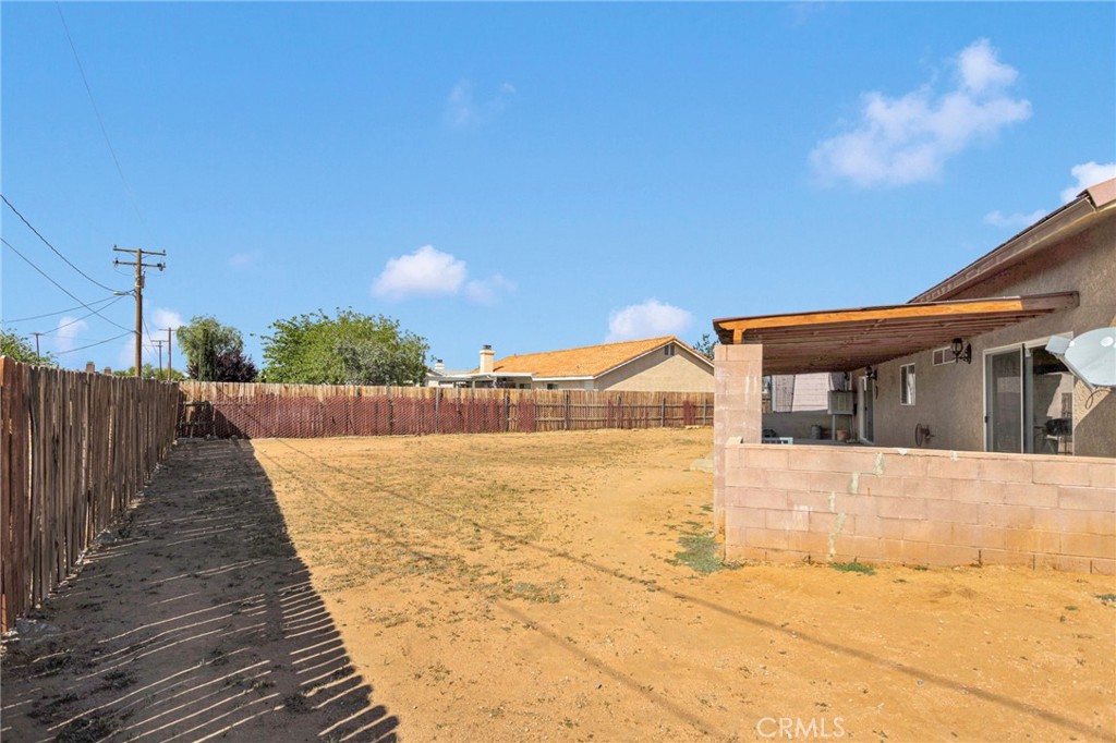 20151 Serrano Road Apple Valley, CA 92307 - Photo 45 of 59 a view of a house with a ocean view