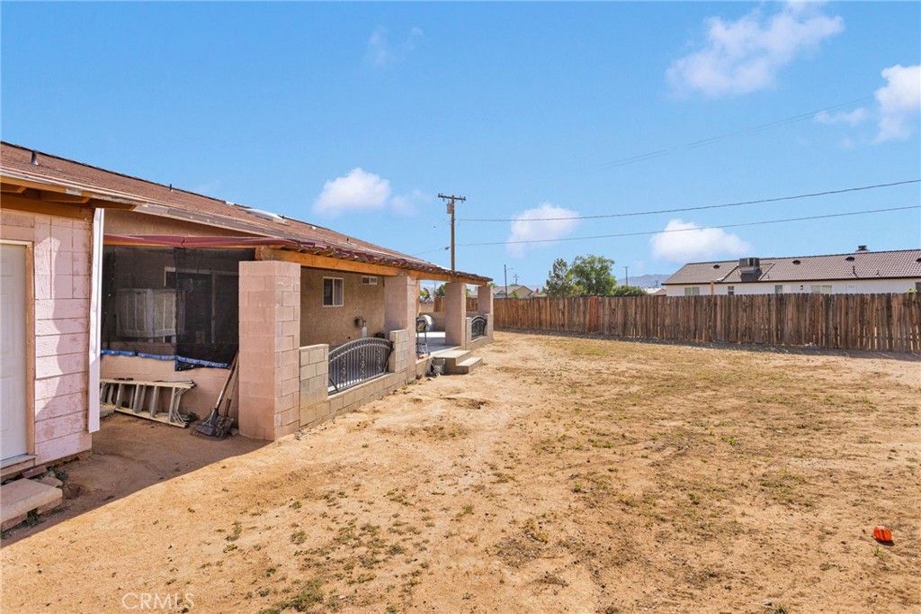 20151 Serrano Road Apple Valley, CA 92307 - Photo 47 of 59 a view of a backyard of a house