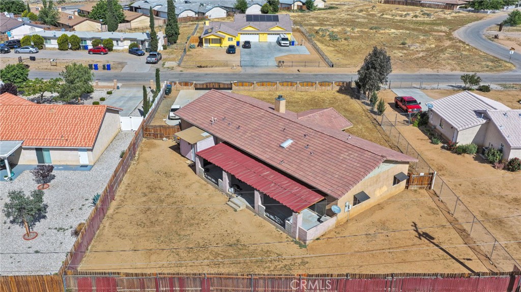 20151 Serrano Road Apple Valley, CA 92307 - Photo 57 of 59 an aerial view of a house with a swimming pool