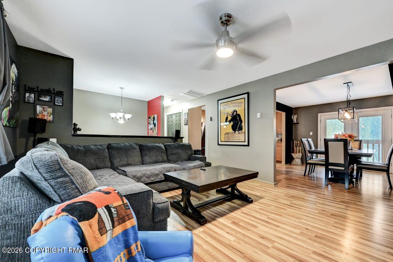 256 Devils Hole Road Cresco, PA 18326 - Photo 15 of 56 a living room with furniture and wooden floor