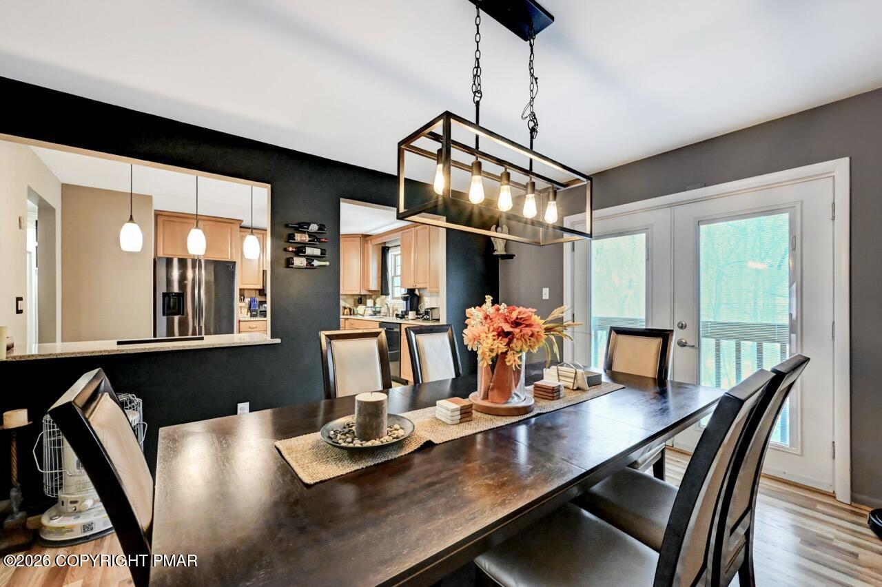 256 Devils Hole Road Cresco, PA 18326 - Photo 18 of 56 a view of a dining room with furniture