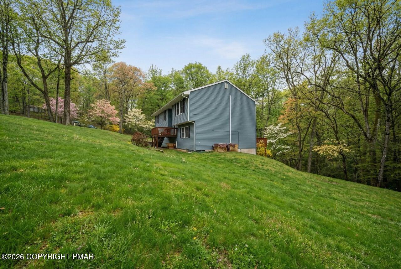 256 Devils Hole Road Cresco, PA 18326 - Photo 3 of 56 a view of backyard of house with green space
