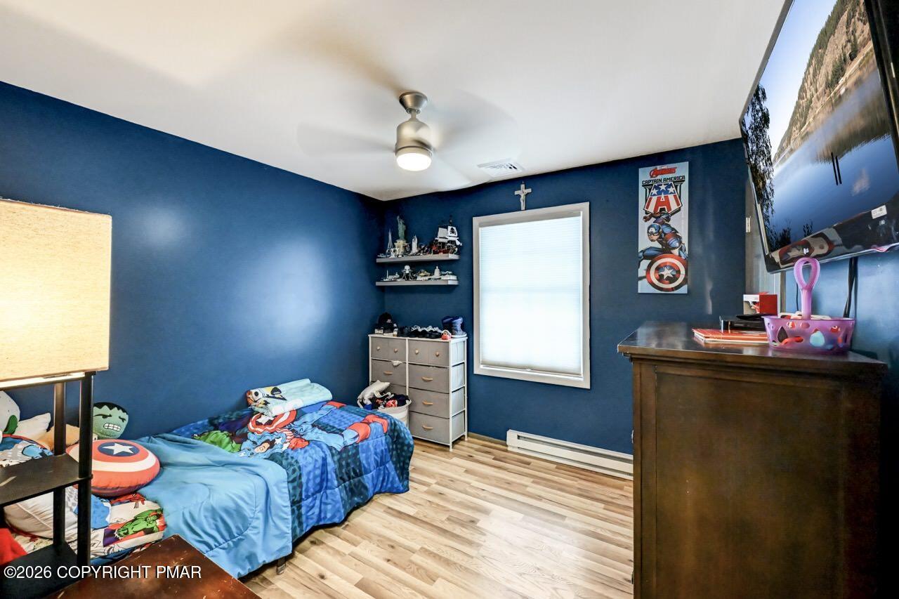 256 Devils Hole Road Cresco, PA 18326 - Photo 34 of 56 a bedroom with furniture and a window