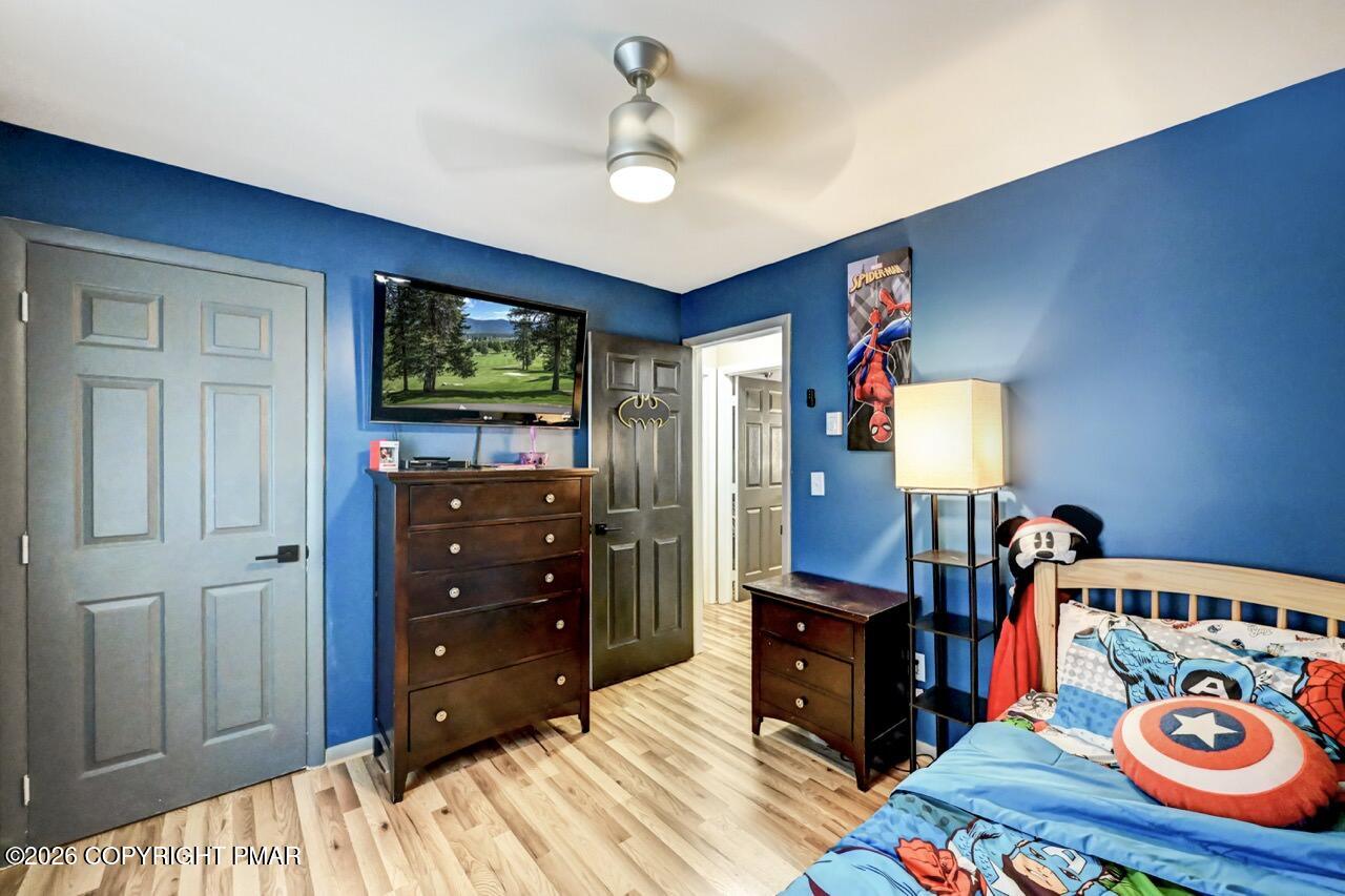 256 Devils Hole Road Cresco, PA 18326 - Photo 36 of 56 a bedroom with a bed and wooden floor