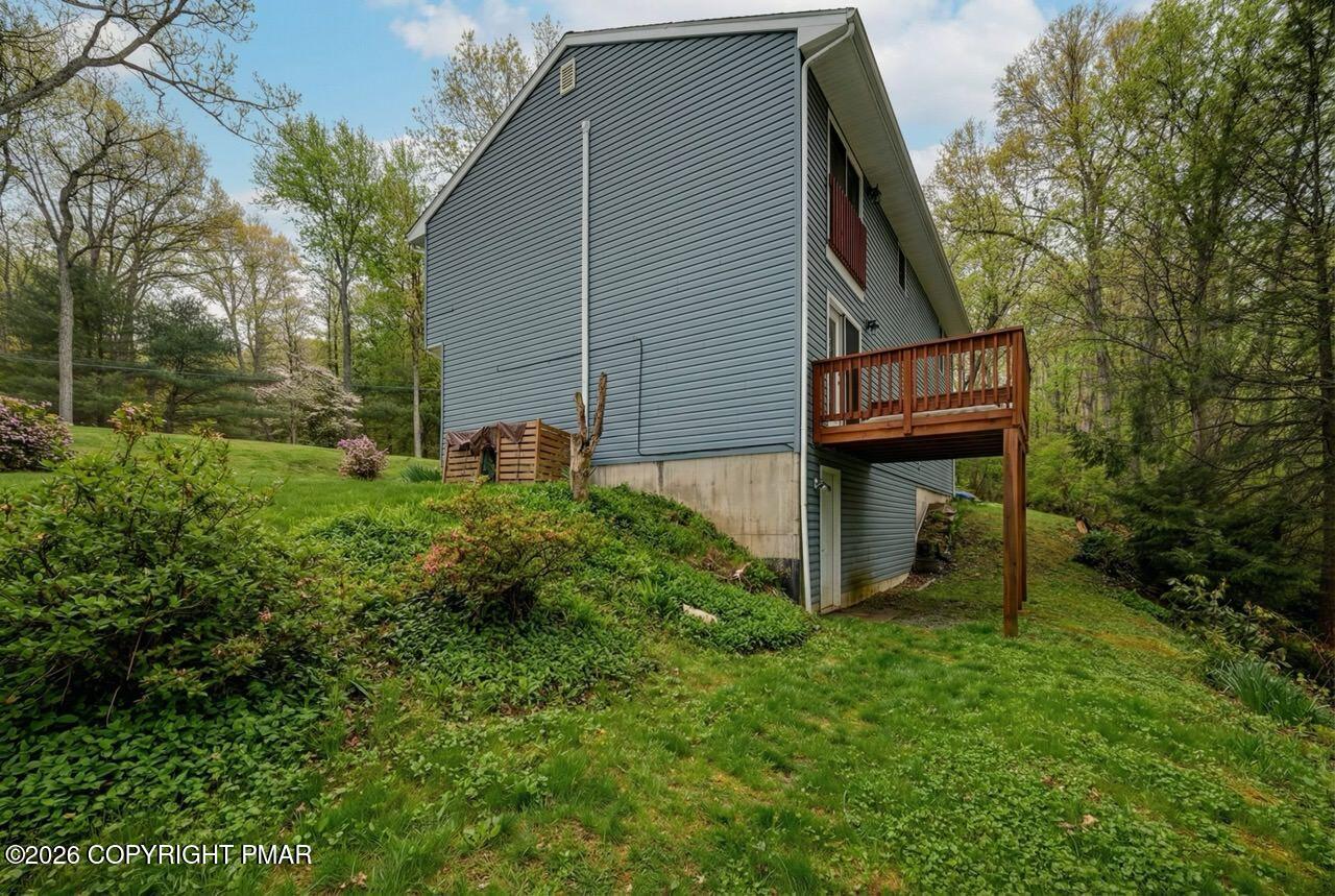 256 Devils Hole Road Cresco, PA 18326 - Photo 55 of 56 a backyard of a house with lots of green space