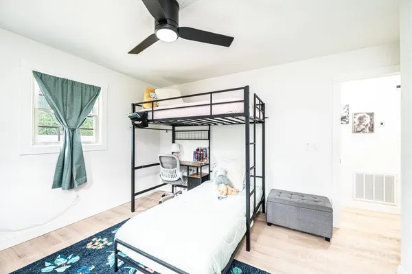 a room with furniture and a window