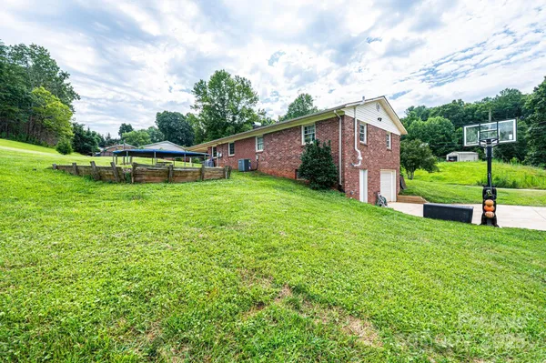 a view of a backyard with garden