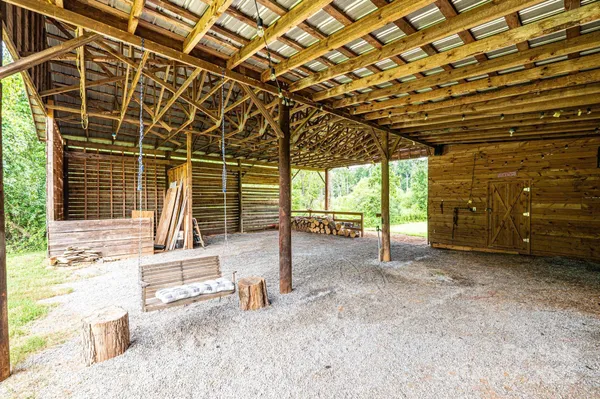 a view of a room with wooden walls