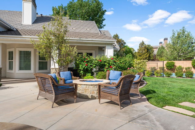 2917 Old Farm Road Washington, UT 84780 - Photo 28 of 105 View of patio with an outdoor living space with a fire pit