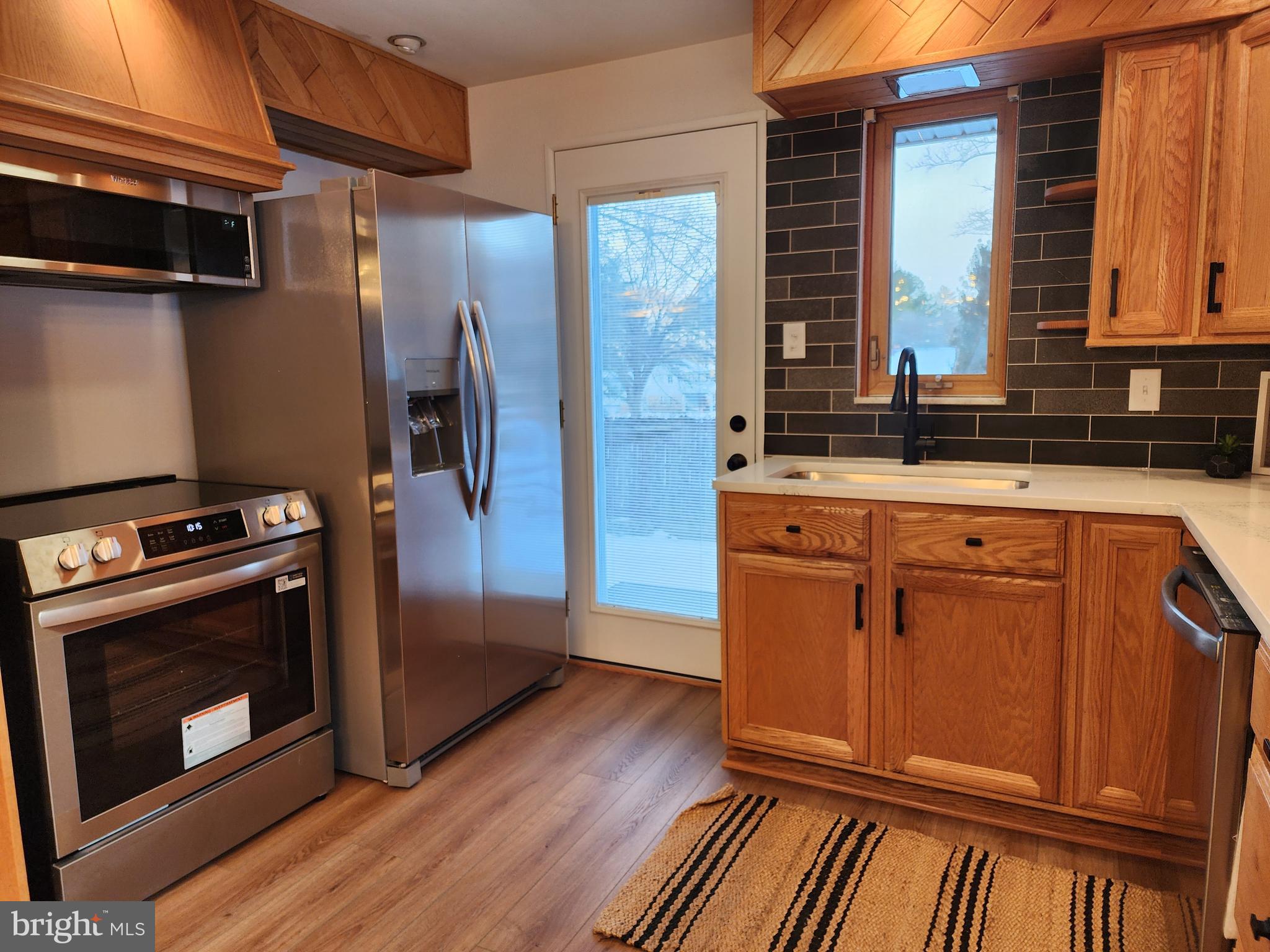 111 South Georgia Street Ridgeley, WV 26753 - Photo 27 of 79 a kitchen with stainless steel appliances granite countertop a refrigerator and a stove