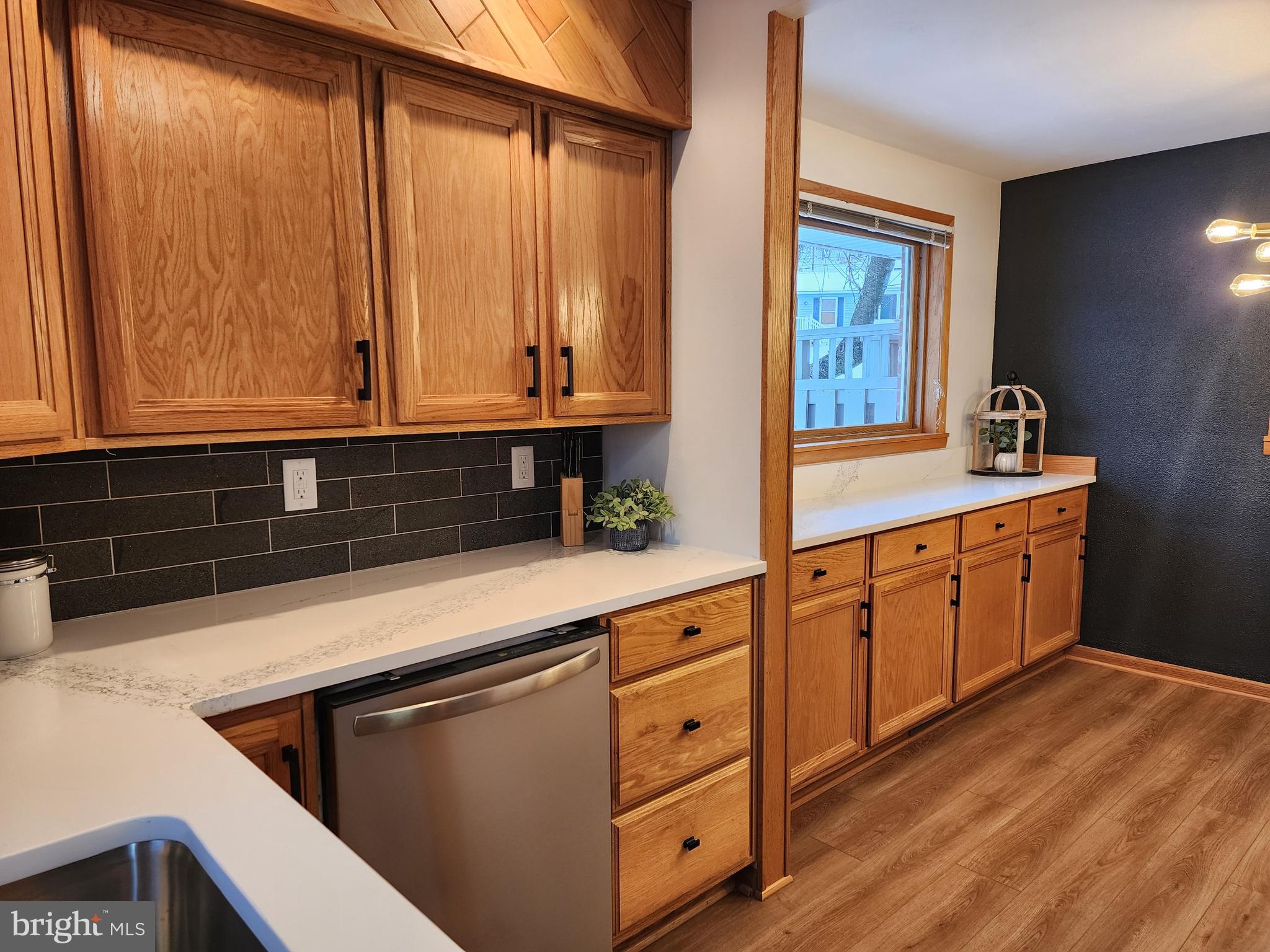 111 South Georgia Street Ridgeley, WV 26753 - Photo 28 of 79 a kitchen with stainless steel appliances granite countertop a sink a stove and a microwave