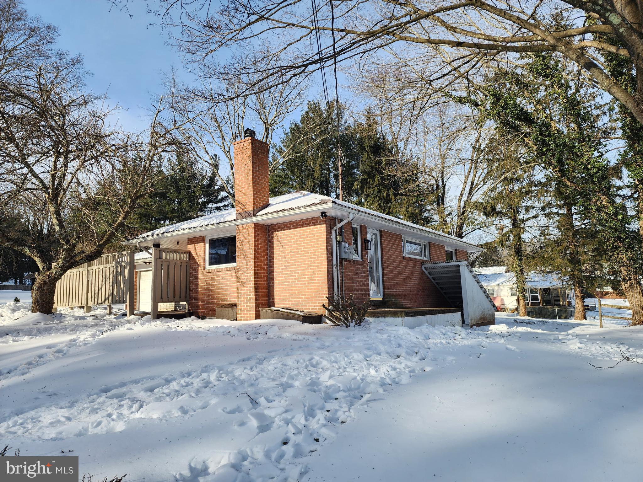 111 South Georgia Street Ridgeley, WV 26753 - Photo 7 of 79 a view of a house with a snow in the yard