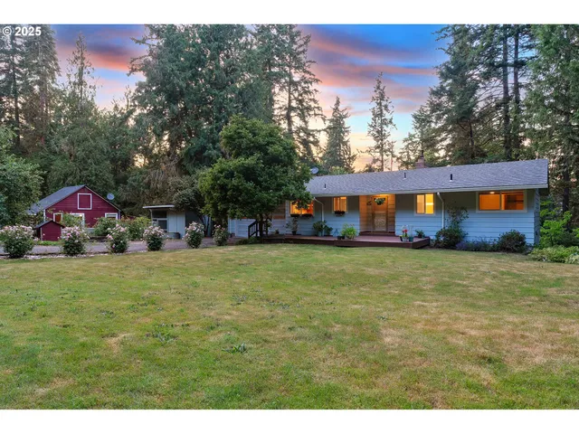 a front view of house with outdoor space and garden