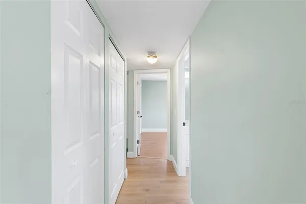 a view of a bathroom from a hallway